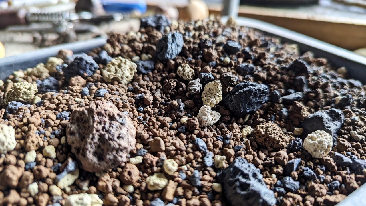Close-up of inorganic bonsai soil mix with akadama pumice and lava rock